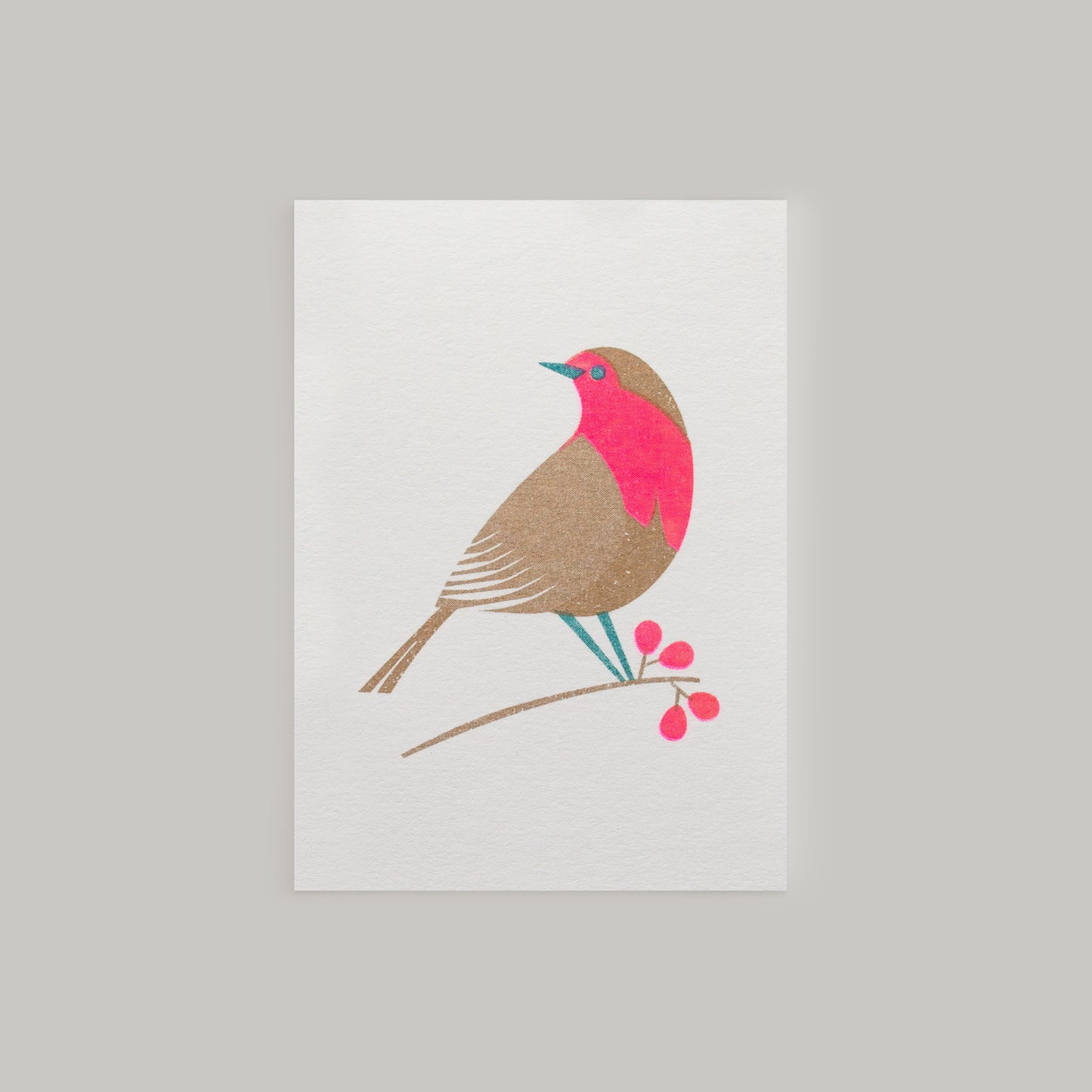 Retro inspired mini Christmas card with festive robin design and envelope risograph printed in gold and bright pink inks.