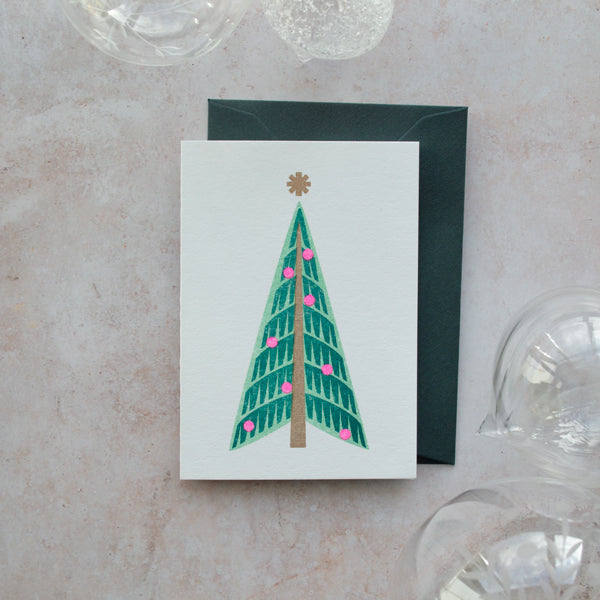 Mid-century modern mini Christmas tree card with envelope. Printed with bright pink, green and gold metallic risograph ink.