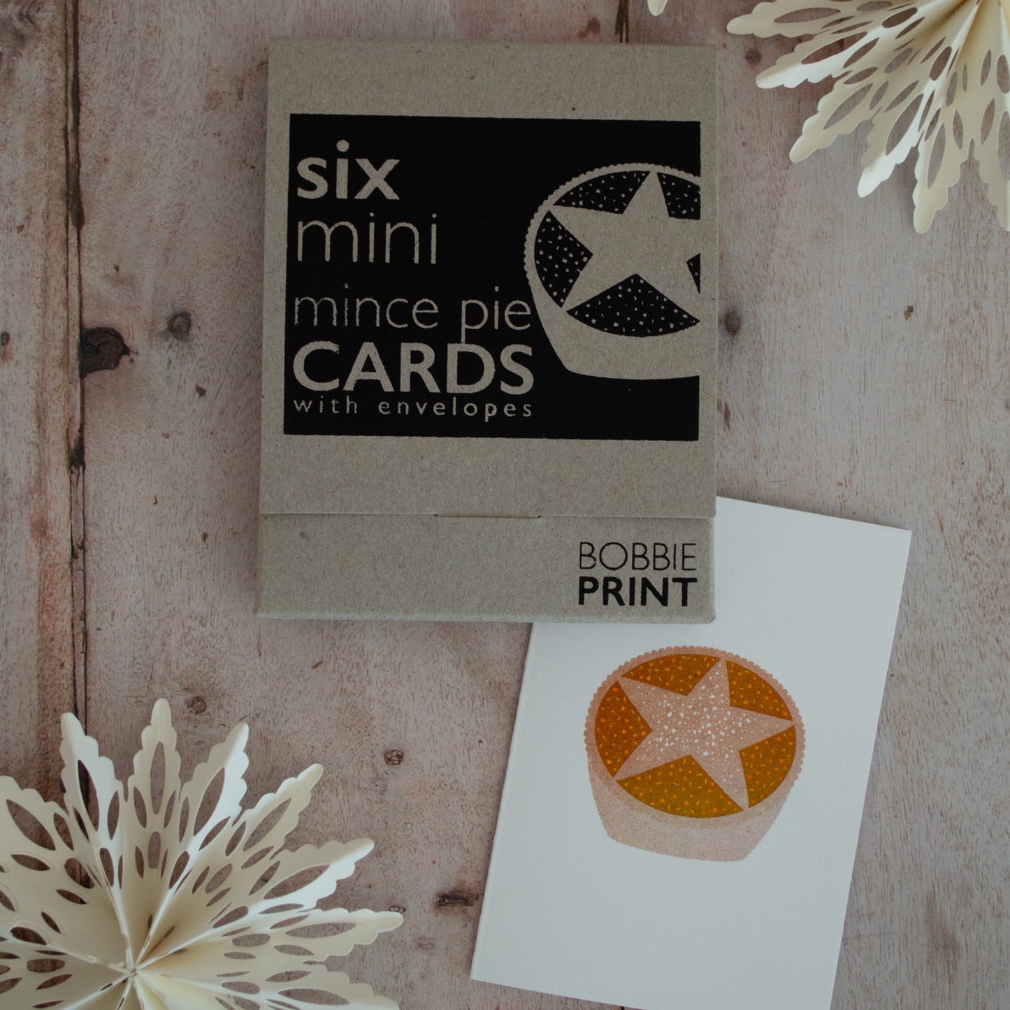 Cheeky mince pie greeting cards suitable for mince pie lovers or haters. This six card pack of mini greeting card is sure to spread a slice of festive cheer and comes in a tiny box.