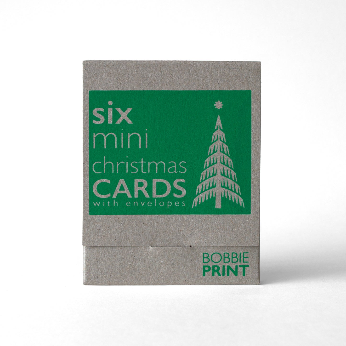 A boxed set of six mini retro style Christmas greeting cards with envelopes, inside a screen printed little box.
