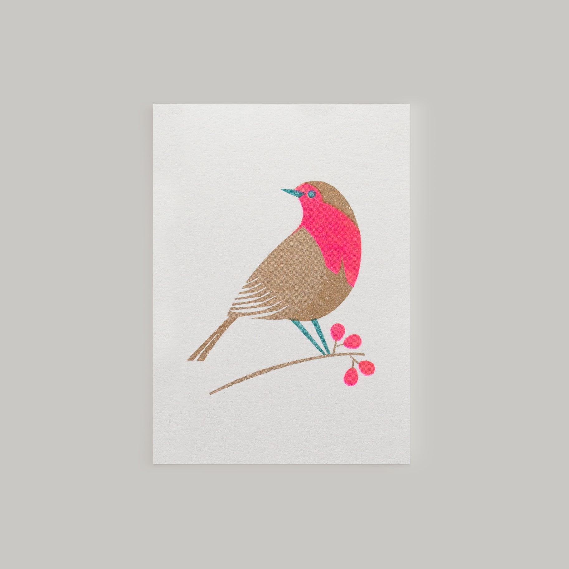 Retro inspired mini Christmas card with festive robin design and envelope risograph printed in gold and bright pink inks.