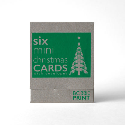 A boxed set of six mini retro style Christmas greeting cards with envelopes, inside a screen printed little box.
